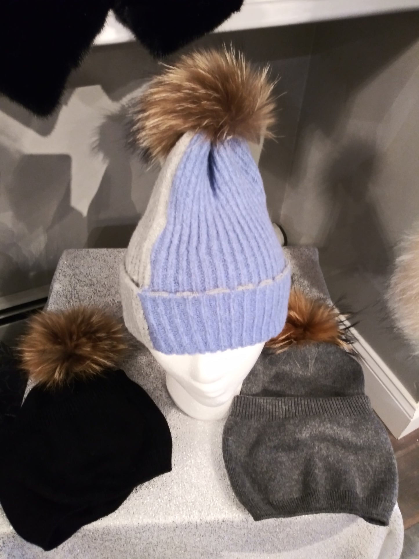 Wool hat with fur pompom